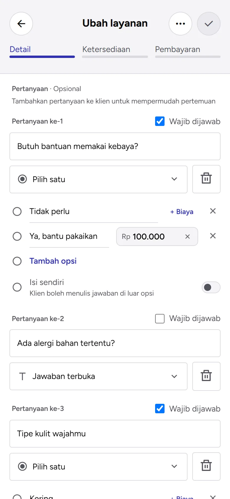 Tangkapan layar: kartu Pertanyaan dengan pertanyaan pilih satu dan opsi berbiaya, tampilan ponsel