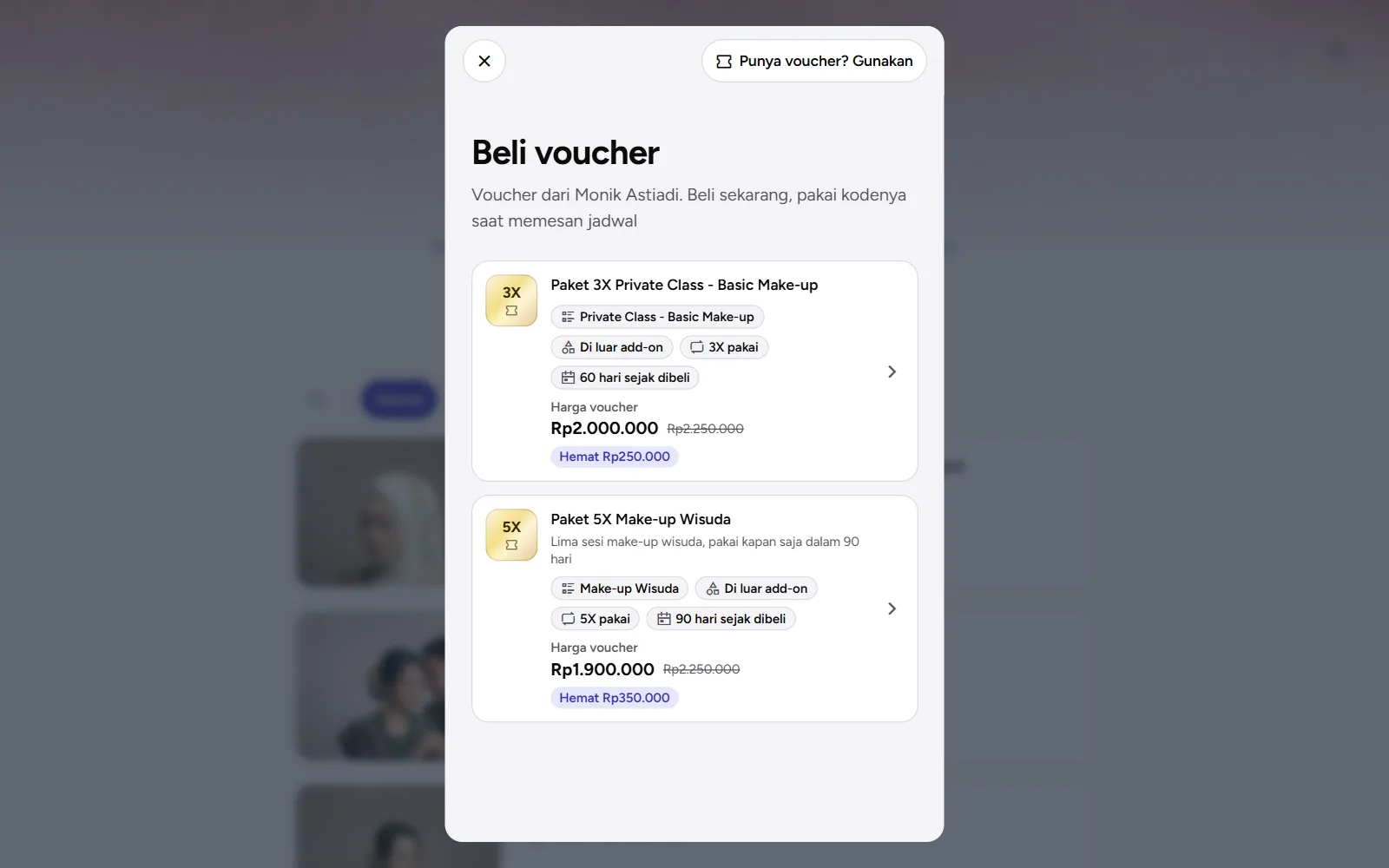 Tangkapan layar: etalase Beli voucher berisi dua voucher dengan harga dan nilai hematnya, tampilan desktop