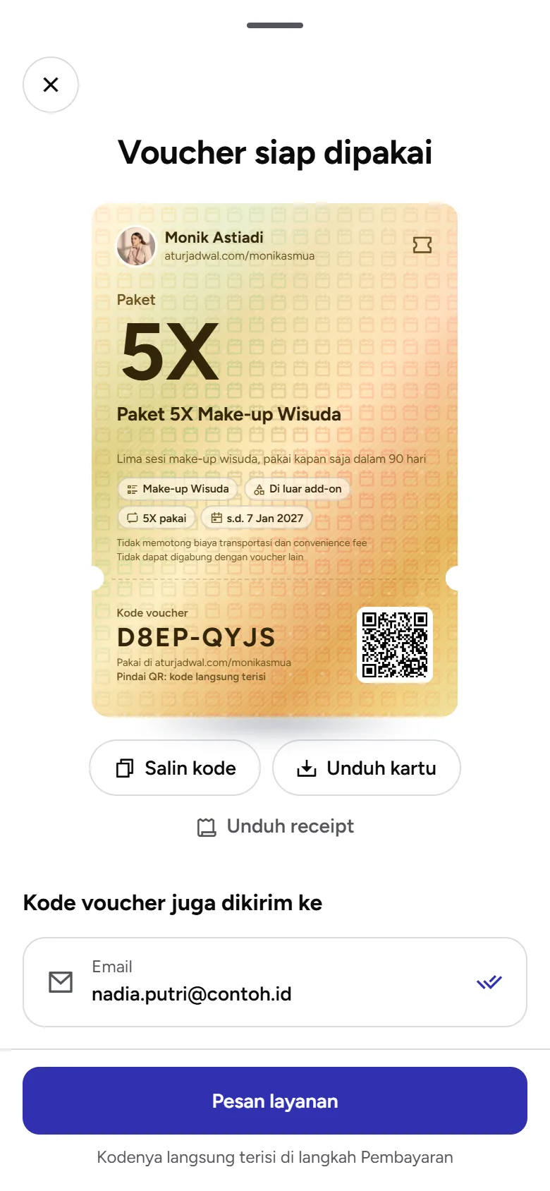 Tangkapan layar: layar Voucher siap dipakai dengan kartu berisi kode milik pembeli, tampilan ponsel